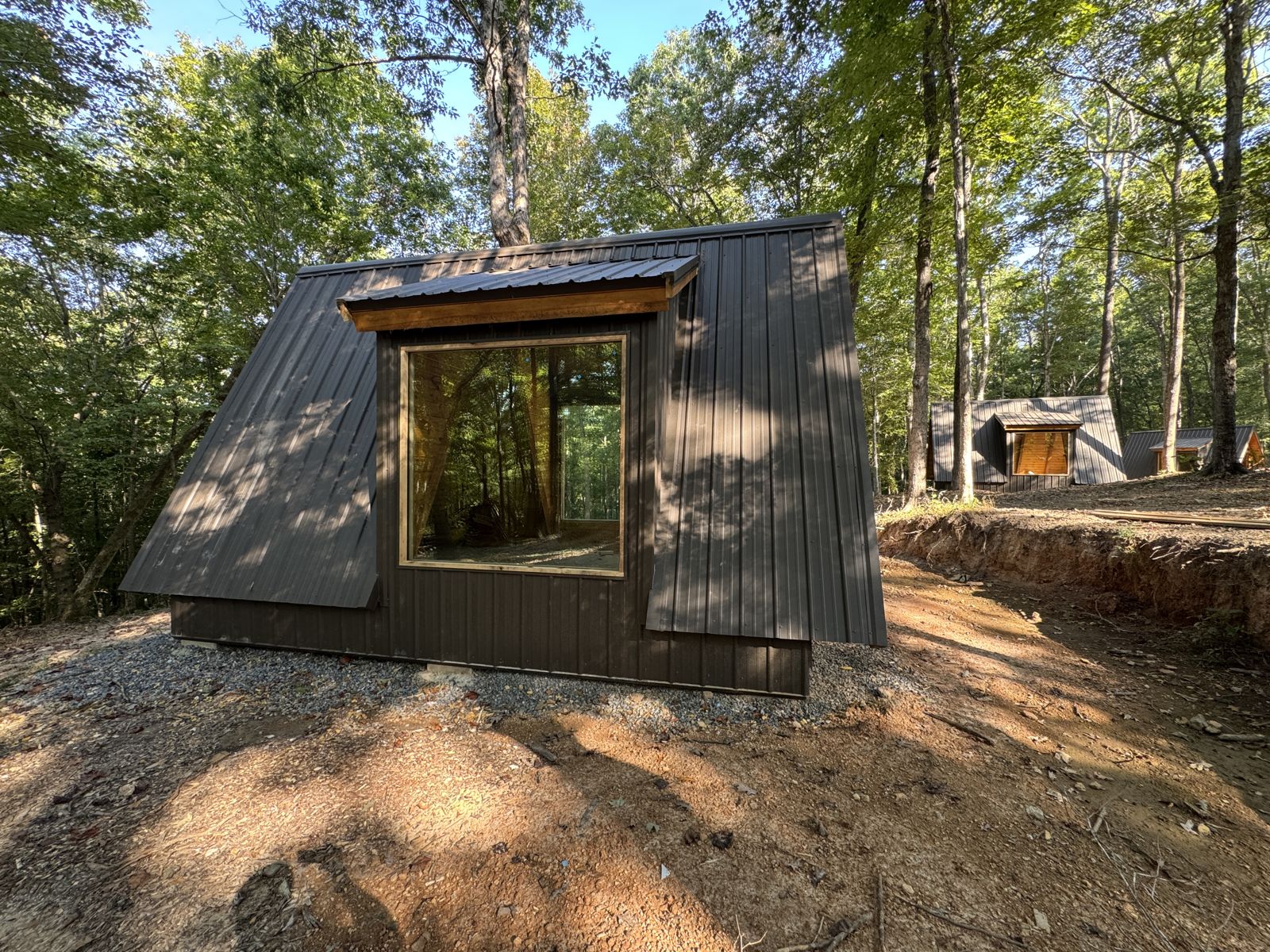 Side dormer window on a glamping cabin